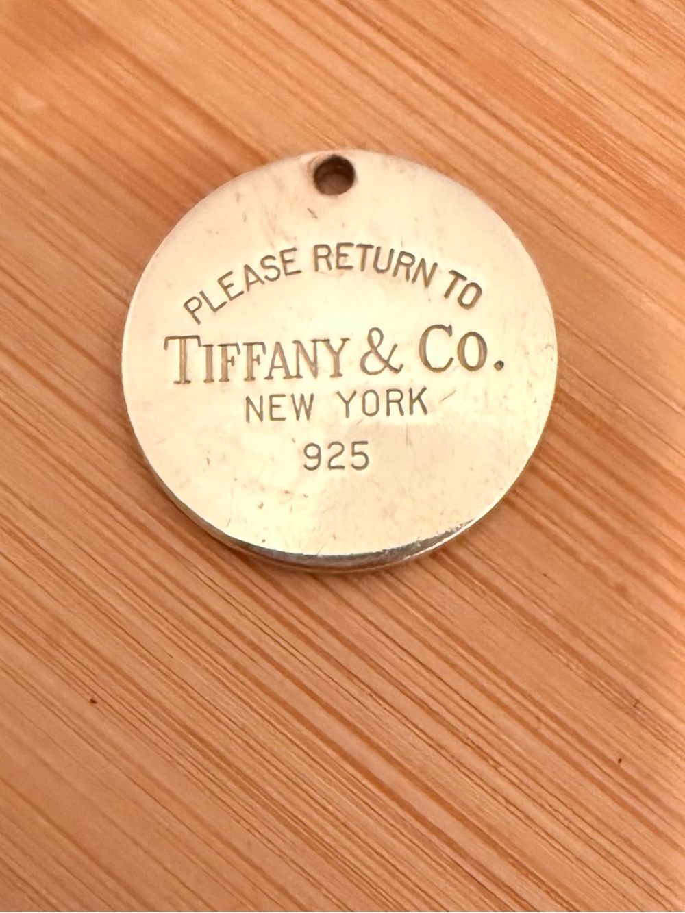 Tiffany & Co. Sterling Silver Round 'Please Return To' Charm Sold